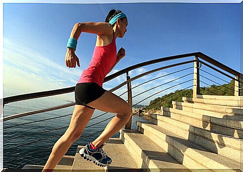 Woman running up stairs