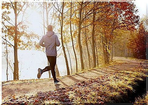 A man running in the woods