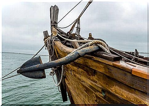 A picture of an old ship sailing at sea