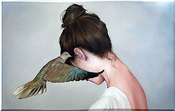 bird whispers to woman