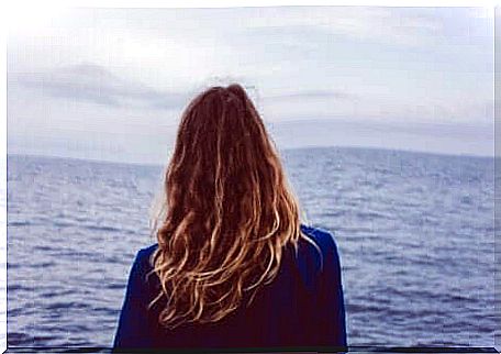 A woman looking out to sea.