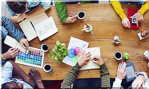 A group of people at a work meeting