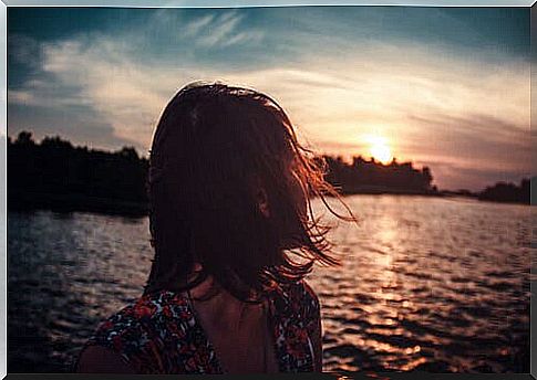 Woman by the sea.