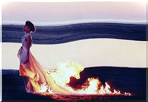 Girl with dress on fire.