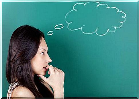 A woman with a cloud drawn over her head.