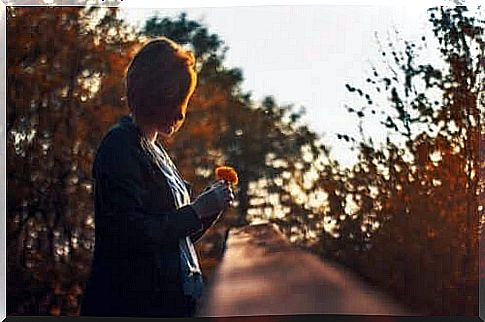 Woman with flower.