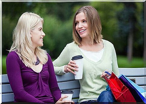 Two girls on a bench.